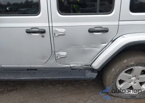 2022 Jeep Wrangler Unlimited Sahara 4X4 z USA, uszkodzony, nr VIN 1C4HJXEG6NW113227